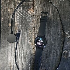 Samsung Black Smartwatch with Charging Cable